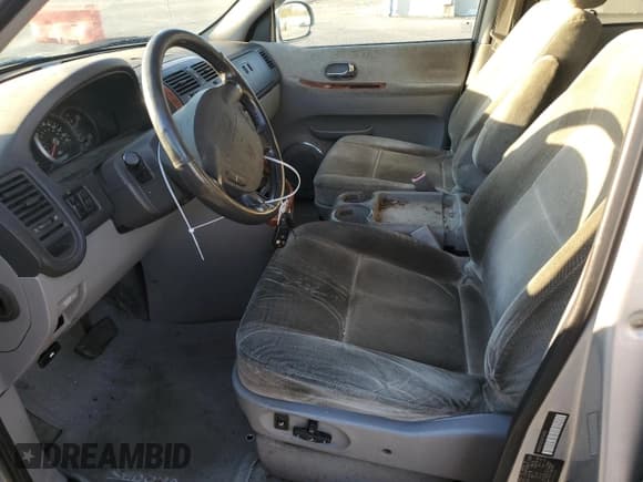 ✅ 2005 Kia Sedona LX • VIN: KNDUP132356759018 • Lot: 91089245. Listed on Copart with 241,426 mi. Free auction sales archive from the USA and detailed vehicle history report at DreamBid. Image 7.
