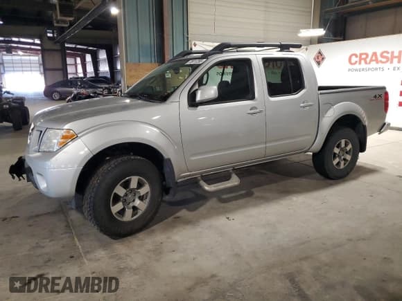 ✅ 2012 Nissan Frontier Pro-4X • VIN: 1N6AD0EV5CC433617 • Lot: 70911255. Listed on Copart with 86,268 mi. Free auction sales archive from the USA and detailed vehicle history report at DreamBid. Image 1.