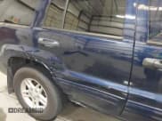 ✅ 2004 Jeep Grand Cherokee Laredo • VIN: 1J4GW48N34C323803 • Lot: 43519623. Listed on IAAI with 179,258 mi. Free auction sales archive from the USA and detailed vehicle history report at DreamBid. Image 6.