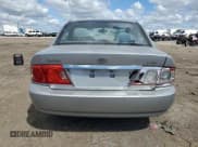 ✅ 2005 Kia Optima LX • VIN: KNAGD128655427167 • Lot: 70038915. Listed on Copart with 174,958 mi. Free auction sales archive from the USA and detailed vehicle history report at DreamBid. Image 6.