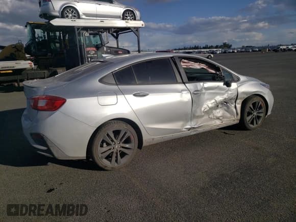 ✅ 2017 Chevrolet Cruze LT • VIN: 1G1BE5SM6H7276525 • Lot: 42003953. Listed on Copart with 71,893 mi. Free auction sales archive from the USA and detailed vehicle history report at DreamBid. Image 3.