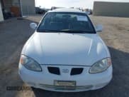 ✅ 2000 Hyundai Elantra • VIN: KMHJW35F0YU158324 • Lot: 43622185. Wystawiony na IAAI z przebiegiem 86 528 mil. Bezpłatny archiwum sprzedaży aukcyjnych z USA i szczegółowy raport historii pojazdu na DreamBid. Zdjęcie 6.