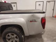 ✅ 2011 GMC Canyon SLT • VIN: 1GTH6NFE2B8131890 • Lot: 43561431. Listed on IAAI with 114,728 mi. Free auction sales archive from the USA and detailed vehicle history report at DreamBid. Image 6.