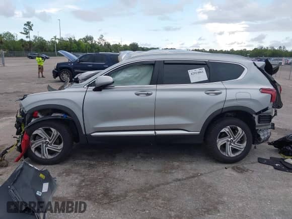 2022 Hyundai Santa Fe SEL z VIN 5NMS2DAJ8NH374641, wystawiony jako IAAI lot #42914061 z przebiegiem Nie podano mil oraz . Historia ofert i sprzedaży dostępna na DreamBid. Obrazek 15.