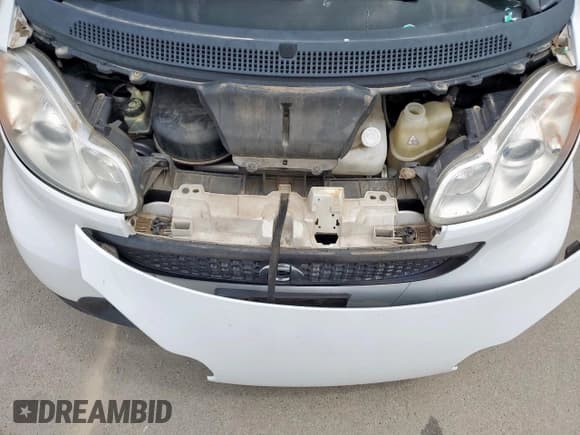 ✅ 2014 Smart fortwo Pure • VIN: WMEEJ3BA7EK775662 • Лот: 71088535. Опубликован ранее на Copart с пробегом Не указан. Бесплатный доступ к архиву аукционных продаж из США и подробный отчёт об истории автомобиля на DreamBid. Изображение 11.