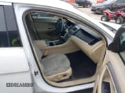 ✅ 2014 Ford Taurus SE • VIN: 1FAHP2D81EG164467 • Лот: 43777381. Опубликован ранее на IAAI с пробегом 123 200 миль. Бесплатный доступ к архиву аукционных продаж из США и подробный отчёт об истории автомобиля на DreamBid. Изображение 5.