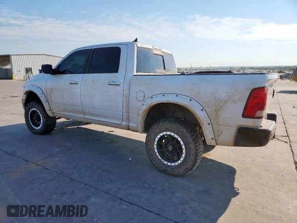 2015 Ram 1500 Lone Star with VIN 1C6RR7LT4FS695728, listed as a Copart auction lot 81709495 with 171,420 mi miles and Salvage title. Bid and sale history available at DreamBid. Image 2.
