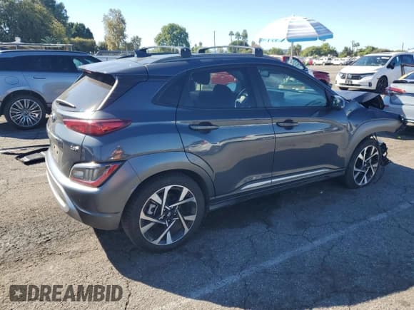 ✅ 2022 Hyundai Kona Limited • VIN: KM8K53A37NU819524 • Лот: 87104535. Опубликован ранее на Copart с пробегом 70 149 миль. Бесплатный доступ к архиву аукционных продаж из США и подробный отчёт об истории автомобиля на DreamBid. Изображение 3.