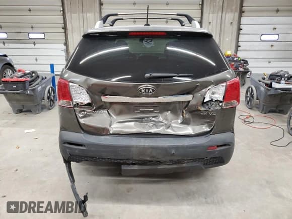✅ 2013 Kia Sorento EX • VIN: 5XYKUDA29DG391069 • Лот: 93184295. Опубликован ранее на Copart с пробегом 199 567 миль. Бесплатный доступ к архиву аукционных продаж из США и подробный отчёт об истории автомобиля на DreamBid. Изображение 6.