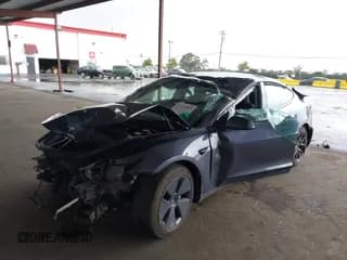 ✅ 2023 Tesla Model 3 • VIN: 5YJ3E1EA5PF693455 • Lot: 43429845. Listed on IAAI with 17,978 mi. Free auction sales archive from the USA and detailed vehicle history report at DreamBid. Image 6.