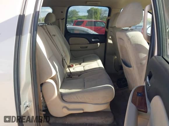 2007 Chevrolet Suburban LTZ z VIN 3GNFK16357G136455, wystawiony jako IAAI lot #43473740 z przebiegiem 242 653 mil mil oraz . Historia ofert i sprzedaży dostępna na DreamBid. Obrazek 8.