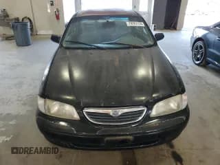 ✅ 1998 Mazda 626 DX • VIN: 1YVGF22C2W5751008 • Lot: 74742174. Wystawiony na Copart z przebiegiem 172 980 mil. Bezpłatny archiwum sprzedaży aukcyjnych z USA i szczegółowy raport historii pojazdu na DreamBid. Zdjęcie 5.