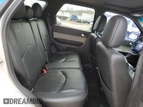 2011 Mercury Mariner z VIN 4M2CN8B73BKJ06886, wystawiony jako Copart lot #50308485 z przebiegiem 118 584 mil mil oraz Szkoda całkowita • Salvage title. Historia ofert i sprzedaży dostępna na DreamBid. Obrazek 11.