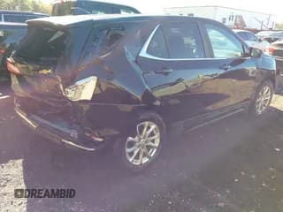 ✅ 2021 Chevrolet Equinox LT • VIN: 2GNAXJEVXM6151801 • Лот: 43462120. Опубликован ранее на IAAI с пробегом 99 944 миль. Бесплатный доступ к архиву аукционных продаж из США и подробный отчёт об истории автомобиля на DreamBid. Изображение 4.