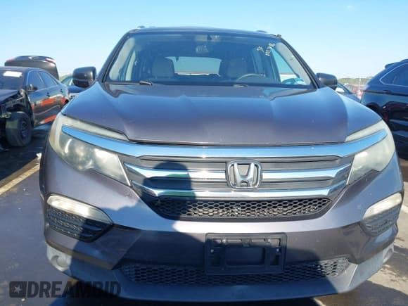 ✅ 2016 Honda Pilot LX • VIN: 5FNYF5H10GB026766 • Lot: 43123186. Listed on IAAI with 246,308 mi. Free auction sales archive from the USA and detailed vehicle history report at DreamBid. Image 12.