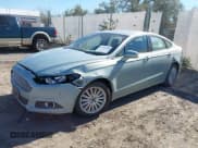 ✅ 2013 Ford Fusion SE Hybrid • VIN: 3FA6P0LU2DR148831 • Лот: 43282206. Опубликован ранее на IAAI с пробегом 160 117 миль. Бесплатный доступ к архиву аукционных продаж из США и подробный отчёт об истории автомобиля на DreamBid. Изображение 2.