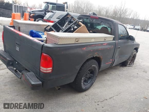 ✅ 2000 Dodge Dakota • VIN: 1B7FL26XXYS720486 • Lot: 43899130. Listed on IAAI with 143,280 mi. Free auction sales archive from the USA and detailed vehicle history report at DreamBid. Image 4.