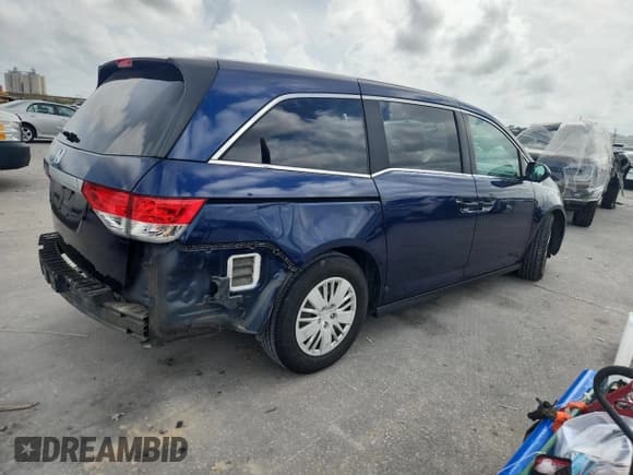 ✅ 2015 Honda Odyssey LX • VIN: 5FNRL5H24FB090989 • Lot: 85265575. Listed on Copart with 129,952 mi. Free auction sales archive from the USA and detailed vehicle history report at DreamBid. Image 3.