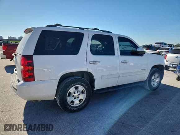 ✅ 2014 Chevrolet Tahoe LS • VIN: 1GNSCAE03ER128175 • Lot: 82465515. Listed on Copart with 254,407 mi. Free auction sales archive from the USA and detailed vehicle history report at DreamBid. Image 3.