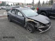 ✅ 2022 Tesla Model 3 Long Range • VIN: 5YJ3E1EB4NF267388 • Lot: 43514904. Listed on IAAI with 46,957 mi. Free auction sales archive from the USA and detailed vehicle history report at DreamBid. Image 1.