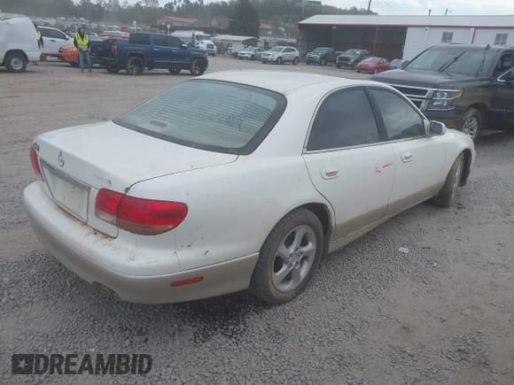 ✅ 2002 Mazda Millenia • VIN: JM1TA221621738040 • Lot: 40597747. Wystawiony na IAAI z przebiegiem Nie podano. Bezpłatny archiwum sprzedaży aukcyjnych z USA i szczegółowy raport historii pojazdu na DreamBid. Zdjęcie 4.