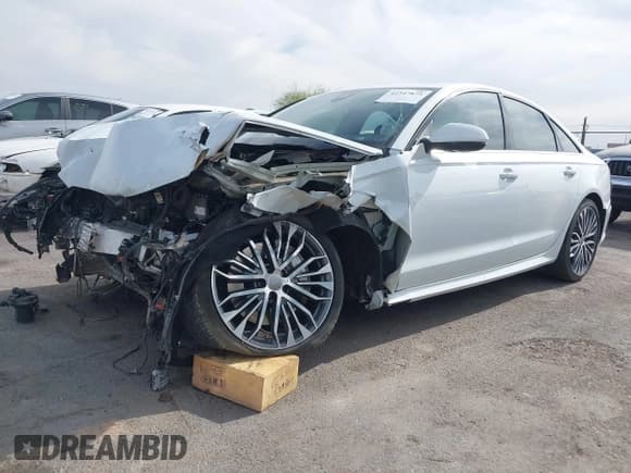 ✅ 2017 Audi A6 Prestige • VIN: WAUH2AFC4HN039271 • Лот: 42347875. Опубликован ранее на IAAI с пробегом 61 553 миль. Бесплатный доступ к архиву аукционных продаж из США и подробный отчёт об истории автомобиля на DreamBid. Изображение 2.