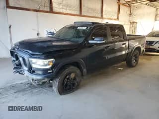 2021 Ram 1500 Rebel with VIN 1C6SRFLTXMN570255, listed as a Copart auction lot 82039215 with 118,213 mi miles and Salvage title. Bid and sale history available at DreamBid. Image 1.