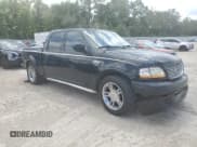 ✅ 2003 Ford F-150 Harley-Davidson • VIN: 1FTRW07393KC28559 • Lot: 55201835. Listed on Copart with 139,288 mi. Free auction sales archive from the USA and detailed vehicle history report at DreamBid. Image 4.