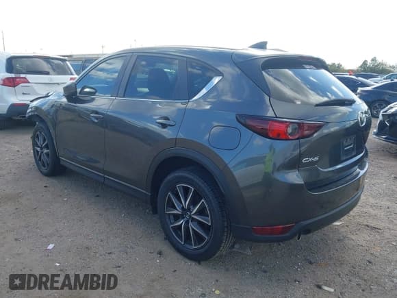 ✅ 2018 Mazda CX-5 Touring • VIN: JM3KFACM8J0375736 • Lot: 43673038. Wystawiony na IAAI z przebiegiem 111 478 mil. Bezpłatny archiwum sprzedaży aukcyjnych z USA i szczegółowy raport historii pojazdu na DreamBid. Zdjęcie 3.