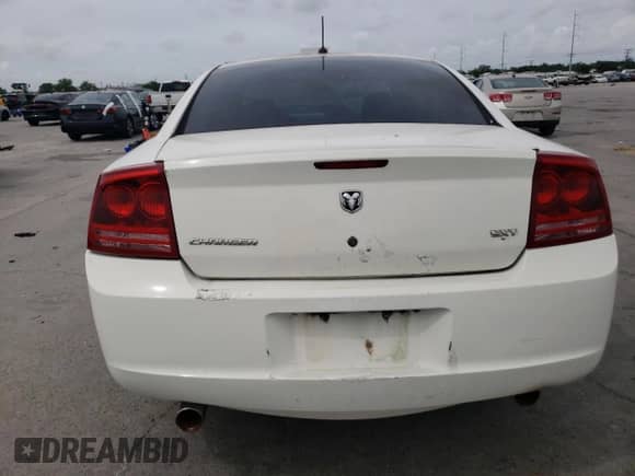2008 Dodge Charger SXT с VIN 2B3KA33G18H214536, выставлен на аукционе Copart как лот 54944975 с пробегом 221 285 миль миль и Списание • Salvage title. История ставок и продаж доступна на DreamBid. Изображение 6.