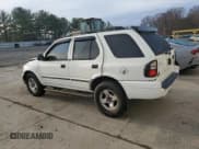 ✅ 2003 Isuzu Rodeo • VIN: 4S2DM58W034303129 • Лот: 83757734. Опубликован ранее на Copart с пробегом 114 274 миль. Бесплатный доступ к архиву аукционных продаж из США и подробный отчёт об истории автомобиля на DreamBid. Изображение 2.