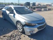 ✅ 2018 Chevrolet Malibu LT • VIN: 1G1ZD5ST0JF143540 • Lot: 43624964. Listed on IAAI with 142,288 mi. Free auction sales archive from the USA and detailed vehicle history report at DreamBid. Image 1.