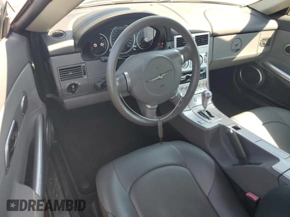✅ 2004 Chrysler Crossfire • VIN: 1C3AN69L14X020796 • Lot: 71561895. Listed on Copart with 43,080 mi. Free auction sales archive from the USA and detailed vehicle history report at DreamBid. Image 8.
