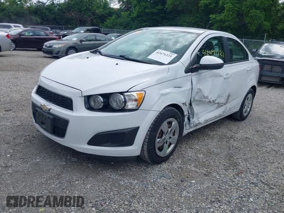 ✅ 2016 Chevrolet Sonic LS • VIN: 1G1JA5SH3G4120520 • Lot: 42471221. Listed on IAAI with 61,637 mi. Free auction sales archive from the USA and detailed vehicle history report at DreamBid. Image 2.