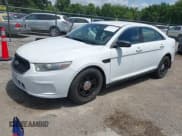 ✅ 2014 Ford Police Interceptor • VIN: 1FAHP2MK7EG127855 • Lot: 42799715. Listed on IAAI with 112,703 mi. Free auction sales archive from the USA and detailed vehicle history report at DreamBid. Image 2.