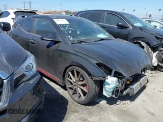 2020 Hyundai Veloster z VIN KMHT36AH1LU005437, wystawiony jako IAAI lot #42073273 z przebiegiem 97 089 mil mil oraz . Historia ofert i sprzedaży dostępna na DreamBid. Obrazek 1.