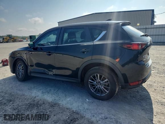 ✅ 2021 Mazda CX-5 Sport • VIN: JM3KFBBM0M1303080 • Lot: 69723505. Listed on Copart with 41,440 mi. Free auction sales archive from the USA and detailed vehicle history report at DreamBid. Image 2.