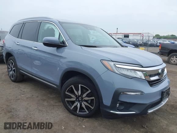 ✅ 2022 Honda Pilot Touring 7-Passenger • VIN: 5FNYF6H68NB056077 • Lot: 42357338. Listed on IAAI with 18,193 mi. Free auction sales archive from the USA and detailed vehicle history report at DreamBid. Image 1.