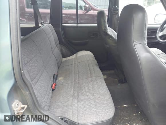 ✅ 1999 Jeep Cherokee Sport • VIN: 1J4FF68S3XL608860 • Lot: 42777688. Listed on IAAI with 248,505 mi. Free auction sales archive from the USA and detailed vehicle history report at DreamBid. Image 8.