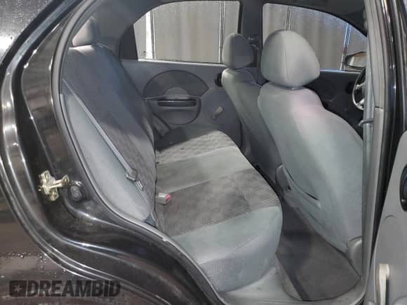 2005 Chevrolet Aveo LS z VIN KL1TD52695B497004, wystawiony jako Copart lot #85917574 z przebiegiem 96 990 mil mil oraz Szkoda całkowita • Salvage title. Historia ofert i sprzedaży dostępna na DreamBid. Obrazek 10.