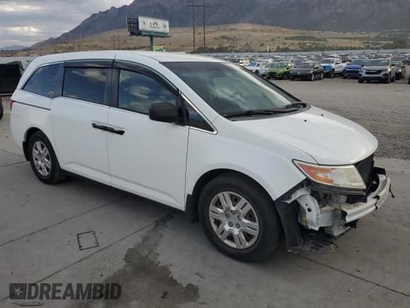 ✅ 2013 Honda Odyssey LX • VIN: 5FNRL5H2XDB082747 • Lot: 80600695. Listed on Copart with 110,873 mi. Free auction sales archive from the USA and detailed vehicle history report at DreamBid. Image 4.