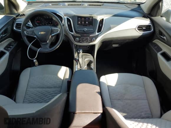 2020 Chevrolet Equinox LS z VIN 2GNAXSEV1L6270762, wystawiony jako Copart lot #69131035 z przebiegiem 153 694 mil mil oraz Szkoda całkowita • Salvage title. Historia ofert i sprzedaży dostępna na DreamBid. Obrazek 8.