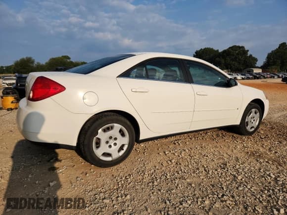 ✅ 2006 Pontiac G6 1SV • VIN: 1G2ZF55B764195713 • Лот: 80301775. Опубликован ранее на Copart с пробегом 241 574 миль. Бесплатный доступ к архиву аукционных продаж из США и подробный отчёт об истории автомобиля на DreamBid. Изображение 3.