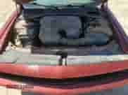 2014 Dodge Challenger SXT 100th Anniversary z VIN 2C3CDYAG8EH247074, wystawiony jako Copart lot #51607505 z przebiegiem 137 538 mil mil oraz Szkoda całkowita • Salvage title. Historia ofert i sprzedaży dostępna na DreamBid. Obrazek 13.