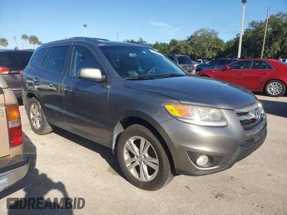 2012 Hyundai Santa Fe Limited с VIN 5XYZK4AG1CG144109, выставлен на аукционе Copart как лот 74305014 с пробегом Не указан миль и На запчасти • Non repairable. История ставок и продаж доступна на DreamBid. Изображение 4.