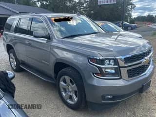2019 Chevrolet Tahoe LT z VIN 1GNSCBKC0KR100687, wystawiony jako Copart lot #85881115 z przebiegiem 105 999 mil mil oraz Czysty tytuł • Clean title. Historia ofert i sprzedaży dostępna na DreamBid. Obrazek 1.