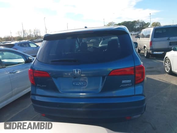 ✅ 2016 Honda Pilot EX-L • VIN: 5FNYF6H52GB036739 • Lot: 43530315. Listed on IAAI with 112,562 mi. Free auction sales archive from the USA and detailed vehicle history report at DreamBid. Image 16.