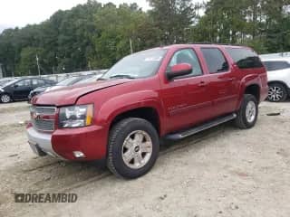 2013 Chevrolet Suburban LT with VIN 1GNSKJE75DR338100, listed as a Copart auction lot 71713385 with 71,442 mi miles and Salvage title. Bid and sale history available at DreamBid. Image 1.