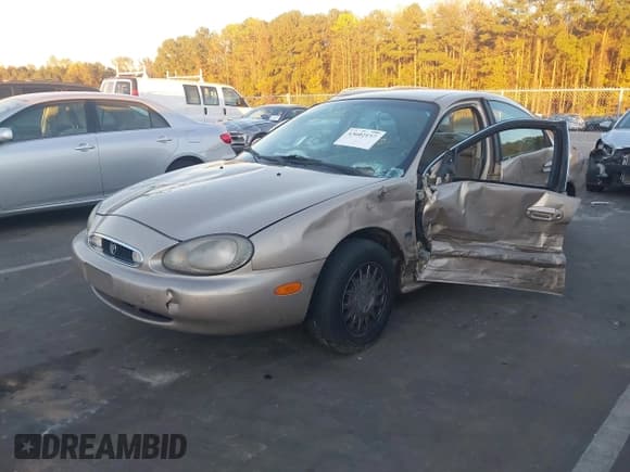 ✅ 1999 Mercury Sable LS • VIN: 1MEFM53SXXA647145 • Lot: 43602157. Listed on IAAI with 184,332 mi. Free auction sales archive from the USA and detailed vehicle history report at DreamBid. Image 17.