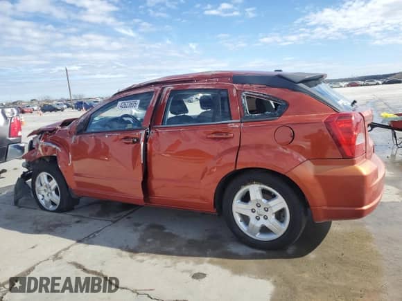 2009 Dodge Caliber SXT с VIN 1B3HB48A79D103294, выставлен на аукционе Copart как лот 42623605 с пробегом 98 798 миль миль и Списание • Salvage title. История ставок и продаж доступна на DreamBid. Изображение 2.
